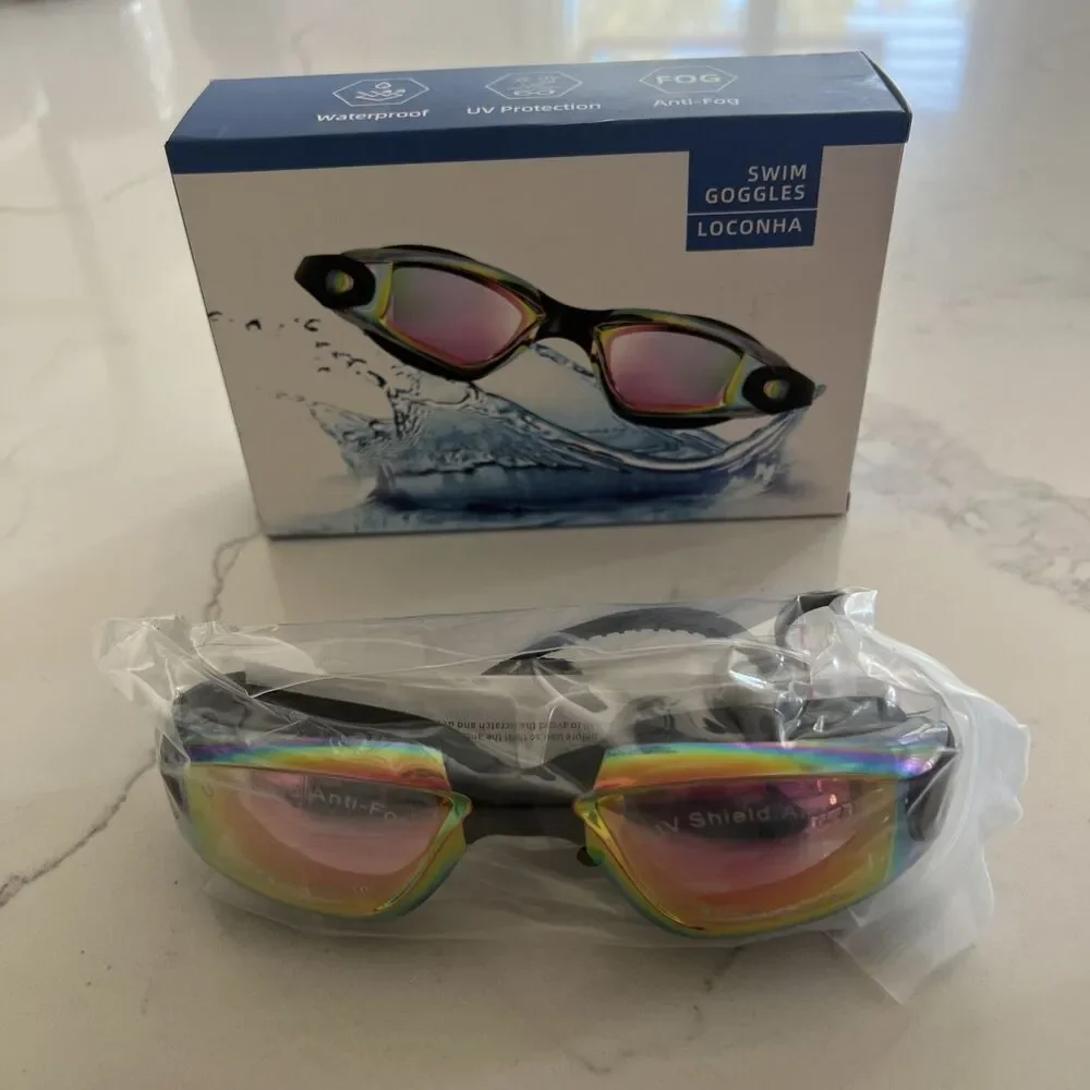 Laconha Swim Goggles Adjustable Anti Leak Anti Fog UV lens Unisex New In Box